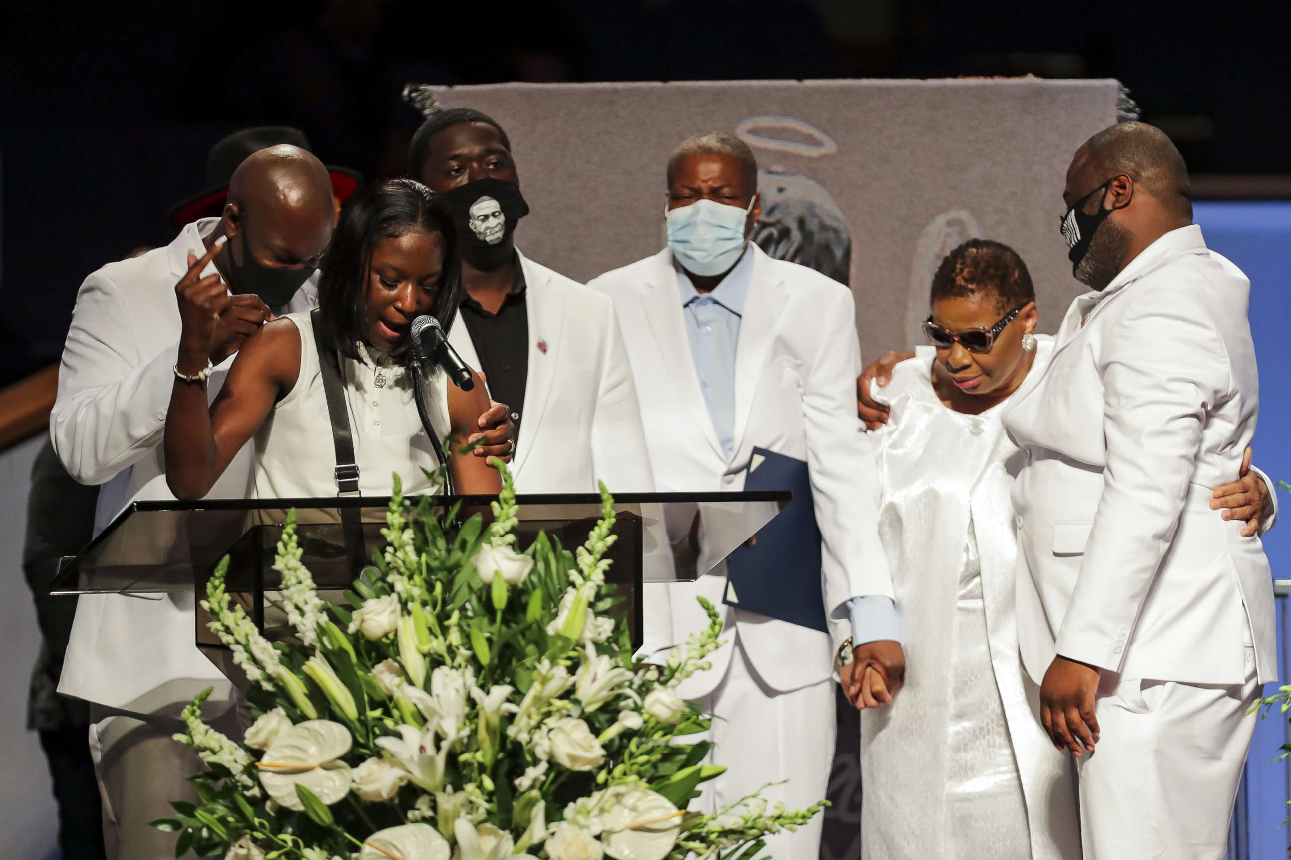 PHOTO: Brooke Williams, niece of George Floyd, speaks with the rest of the family, during the funeral for George Floyd at The Fountain of Praise Church on June 9, 2020, in Houston.