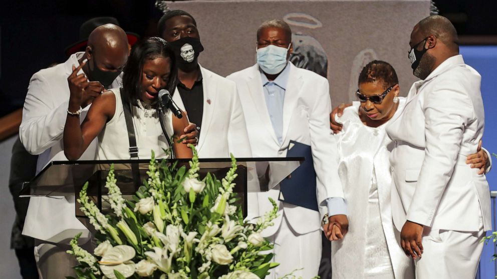 PHOTO: Brooke Williams, niece of George Floyd, speaks with the rest of the family, during the funeral for George Floyd at The Fountain of Praise Church on June 9, 2020, in Houston.