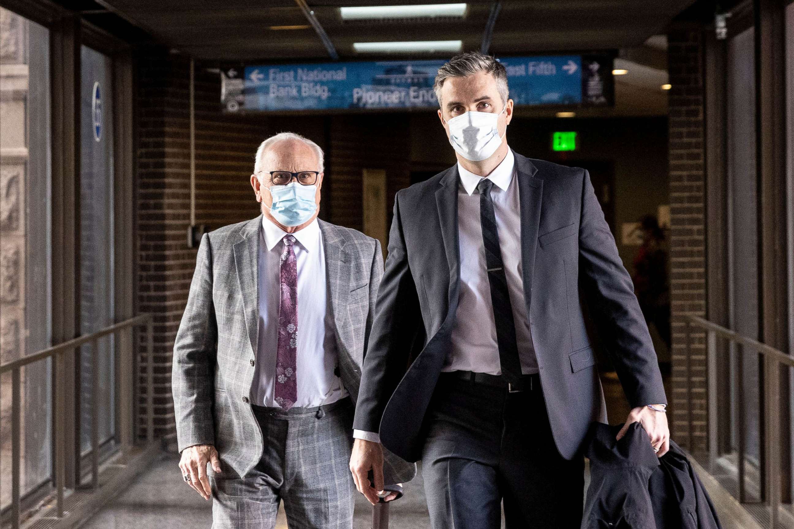 PHOTO: Former Minneapolis Police Officer Thomas Lane (R) arrives for the pre-trial of three former Minneapolis police officers charged with federal civil rights violations in George Floyd's death in St. Paul, Minn., on Jan. 11, 2022.