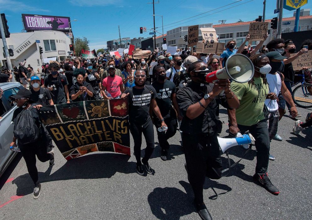 PHOTO: In this May 30, 2020, file photo, demonstrators march in the Fairfax District in Los Angeles, during a protest for death of George Floyd.