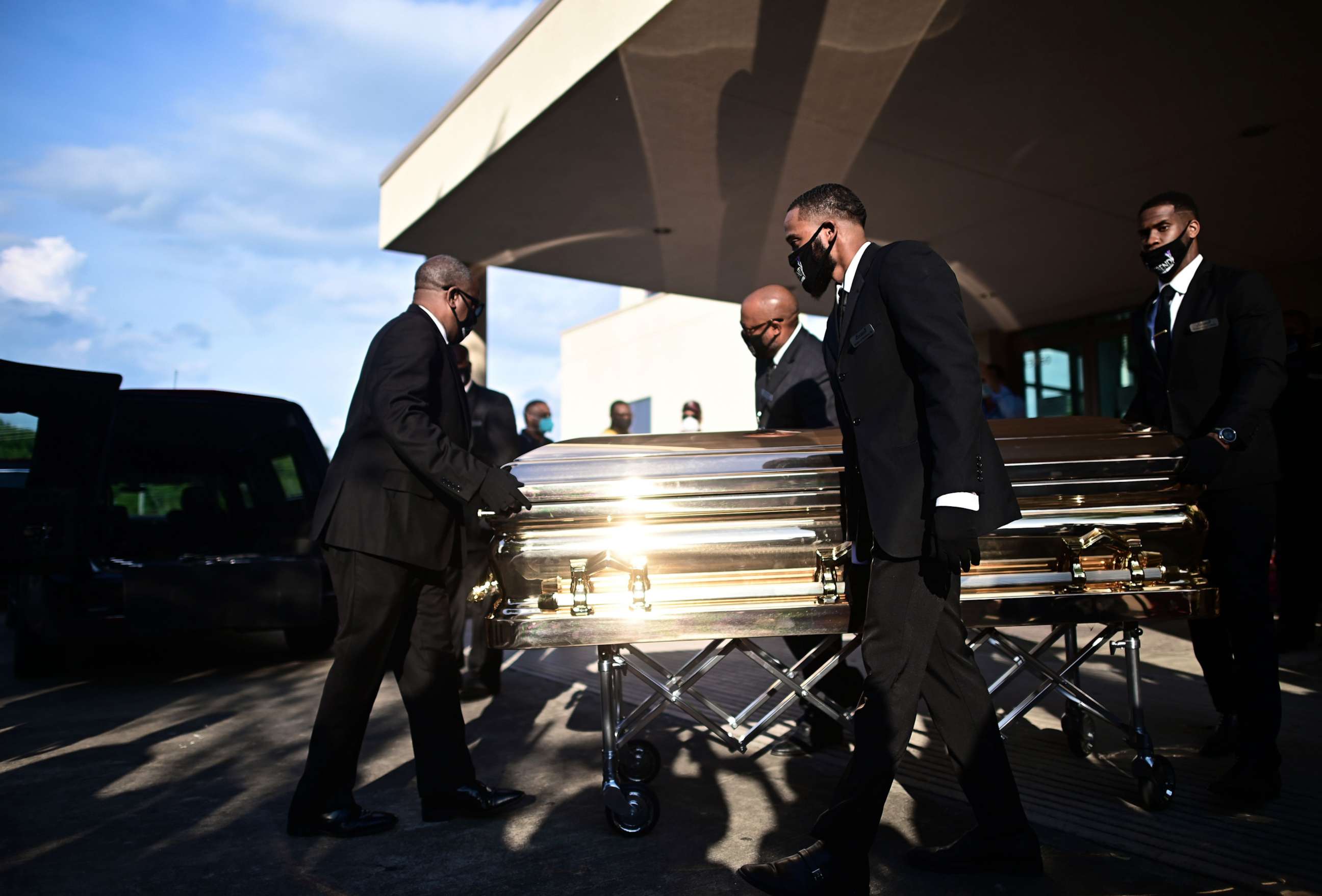 PHOTO: Pallbearers move the casket of George Floyd after a public viewing at The Fountain of Praise church in Houston, Texas, on June 8, 2020.