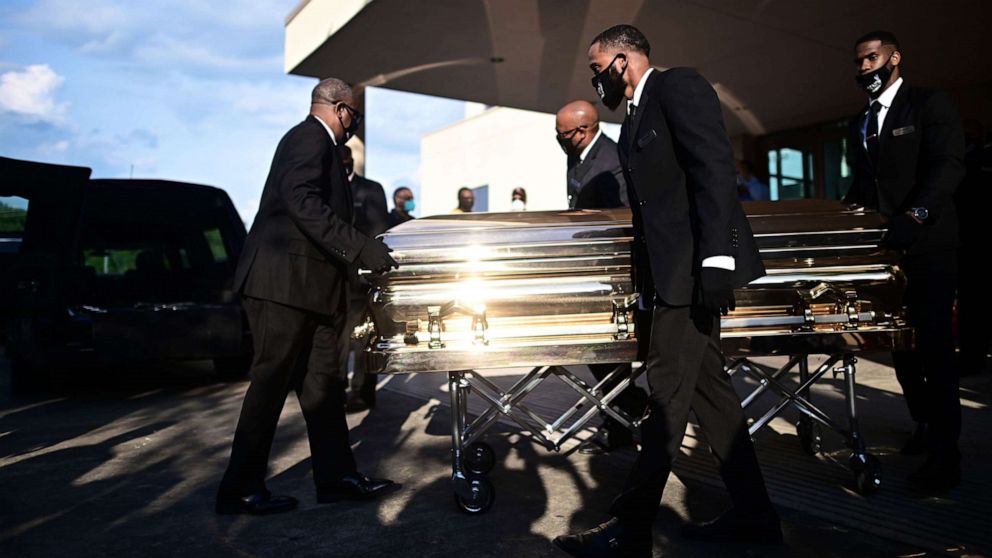 PHOTO: Pallbearers move the casket of George Floyd after a public viewing at The Fountain of Praise church in Houston, Texas, on June 8, 2020.