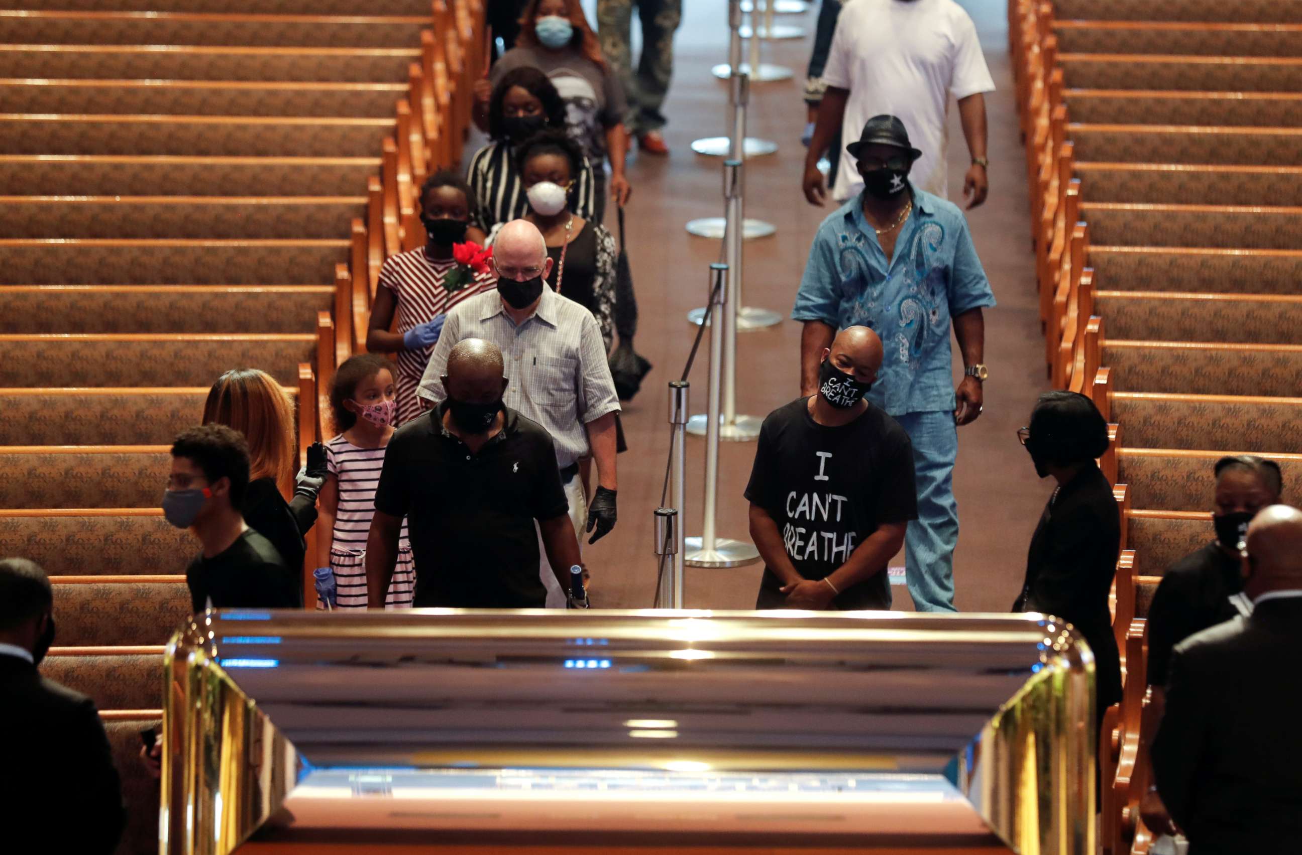 PHOTO: People pay their respects during the public viewing for George Floyd in Houston, June 8, 2020.