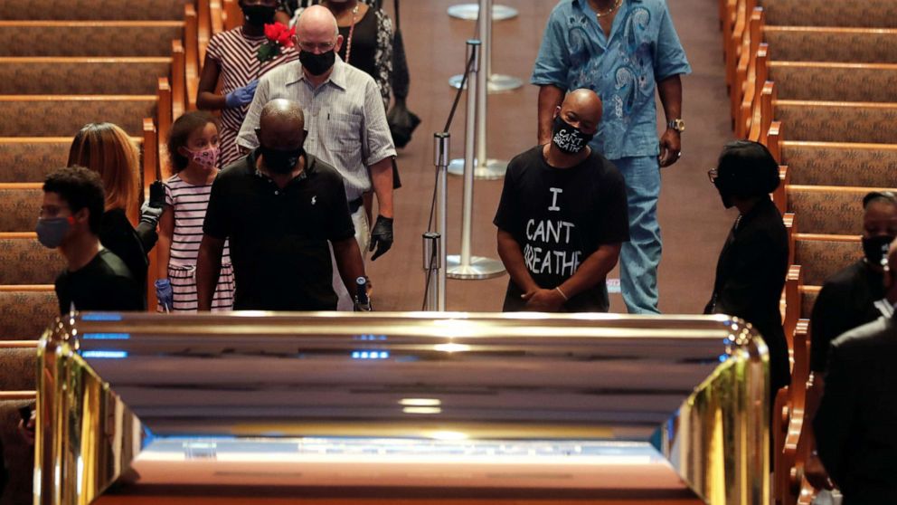 PHOTO: People pay their respects during the public viewing for George Floyd in Houston, June 8, 2020.