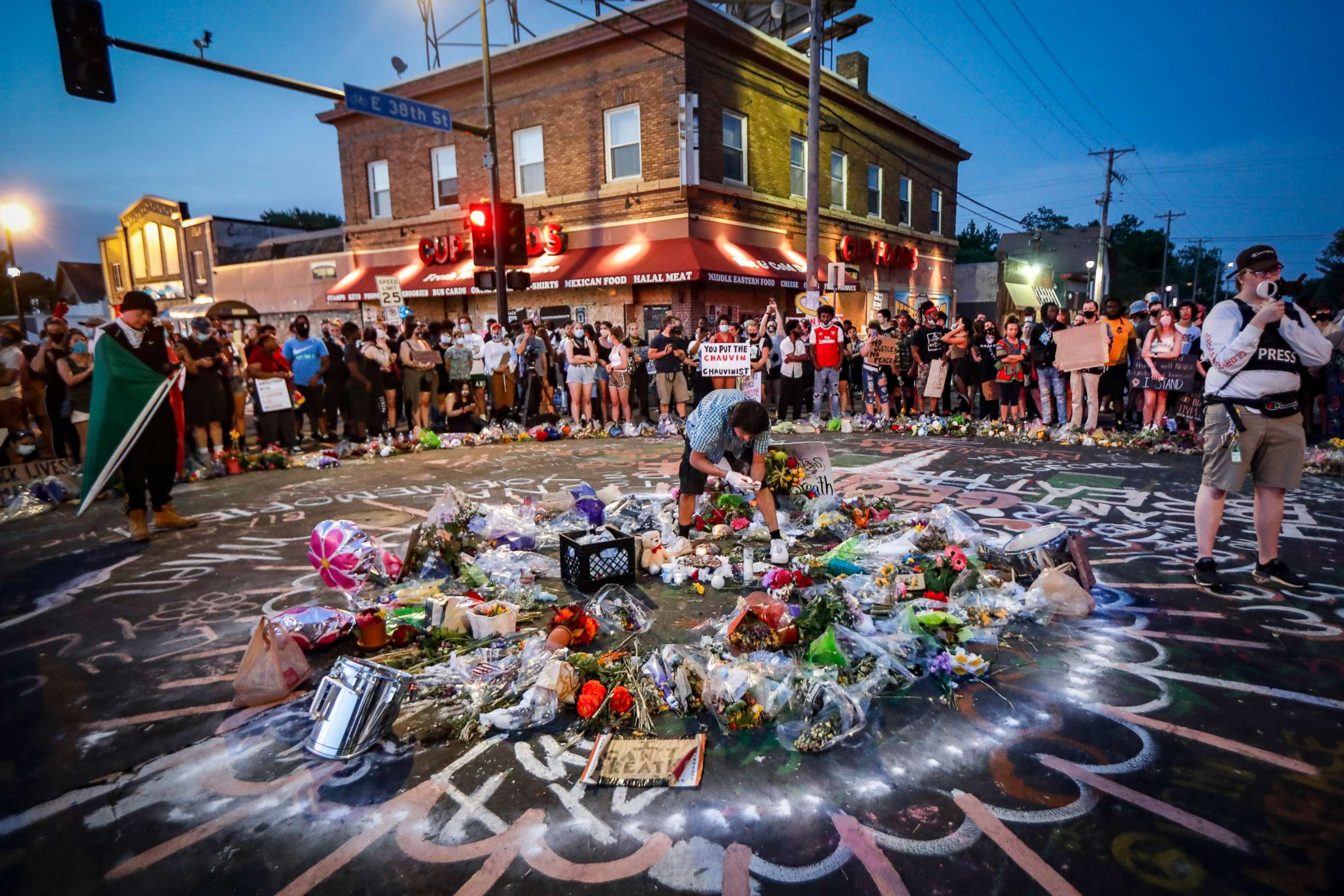 PHOTO: Protesters gather at a memorial for George Floyd where he died outside Cup Foods on East 38th Street and Chicago Avenue, June 1, 2020, in Minneapolis.