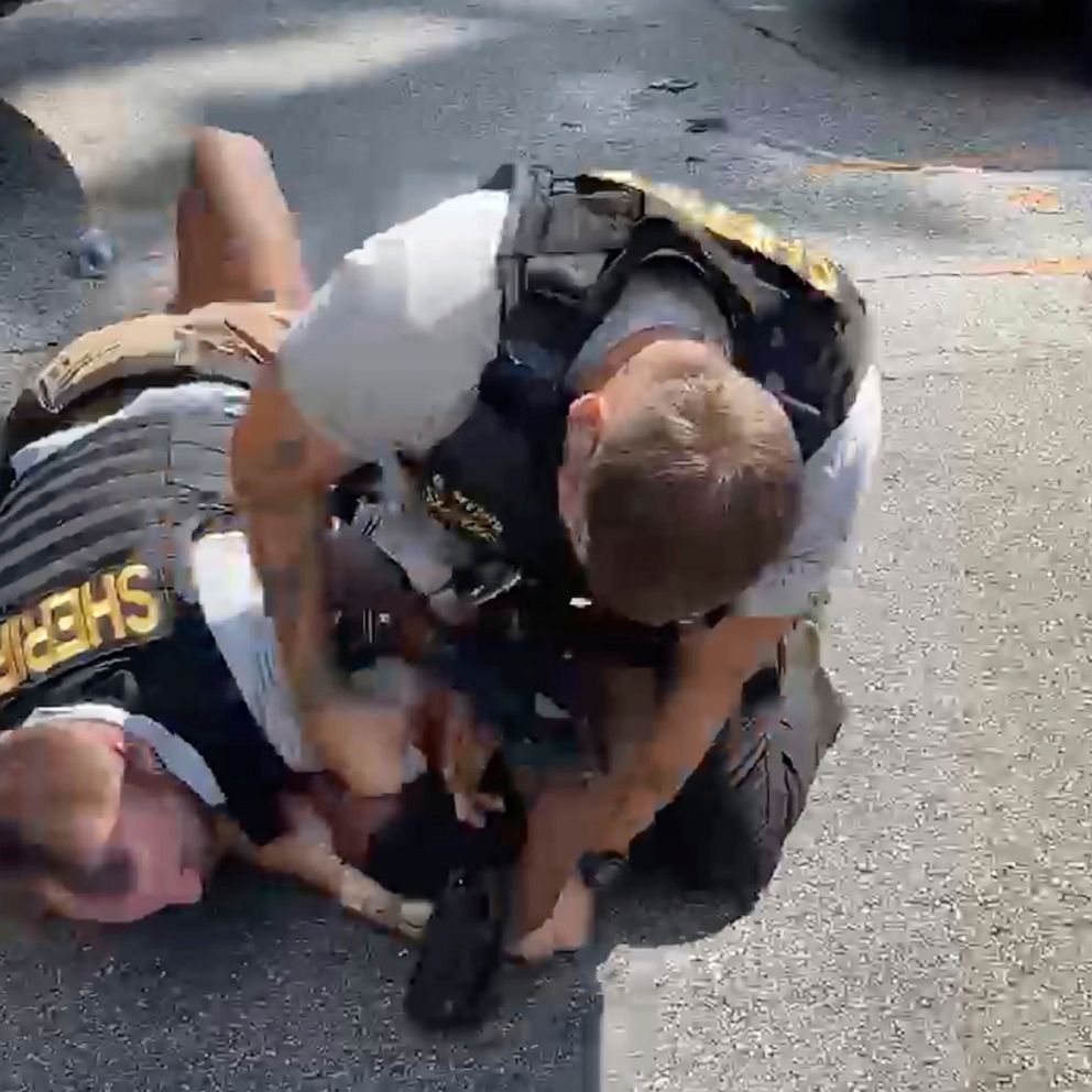 PHOTO: A Clayton County, Ga., sheriff's deputy holds down Roderick Walker on the ground, Sept. 11, 2020, following a traffic stop.