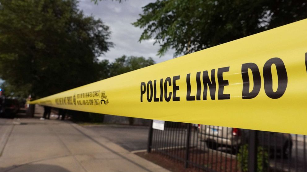 PHOTO: CHICAGO, ILLINOIS - JUNE 23: Police tape surrounds a crime scene where three people were shot at the Wentworth Gardens housing complex in the Bridgeport neighborhood on June 23, 2021 in Chicago, Illinois. 