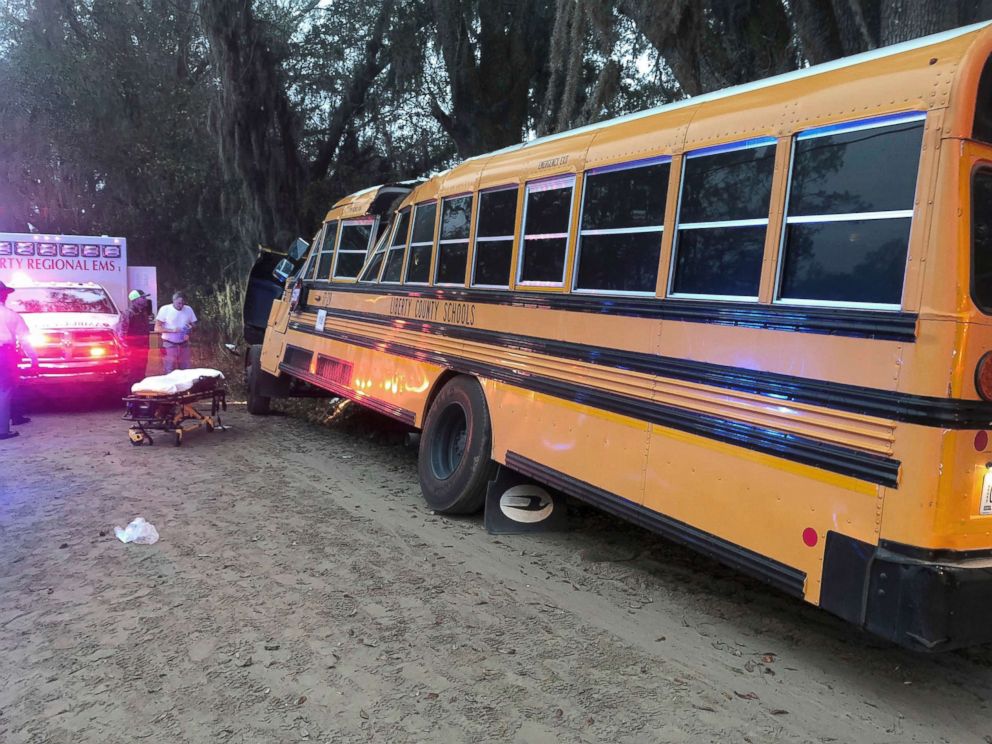 PHOTO: Authorities investigate the scene where a school bus crashed, Dec. 5, 2017, in Gum Branch, Ga.