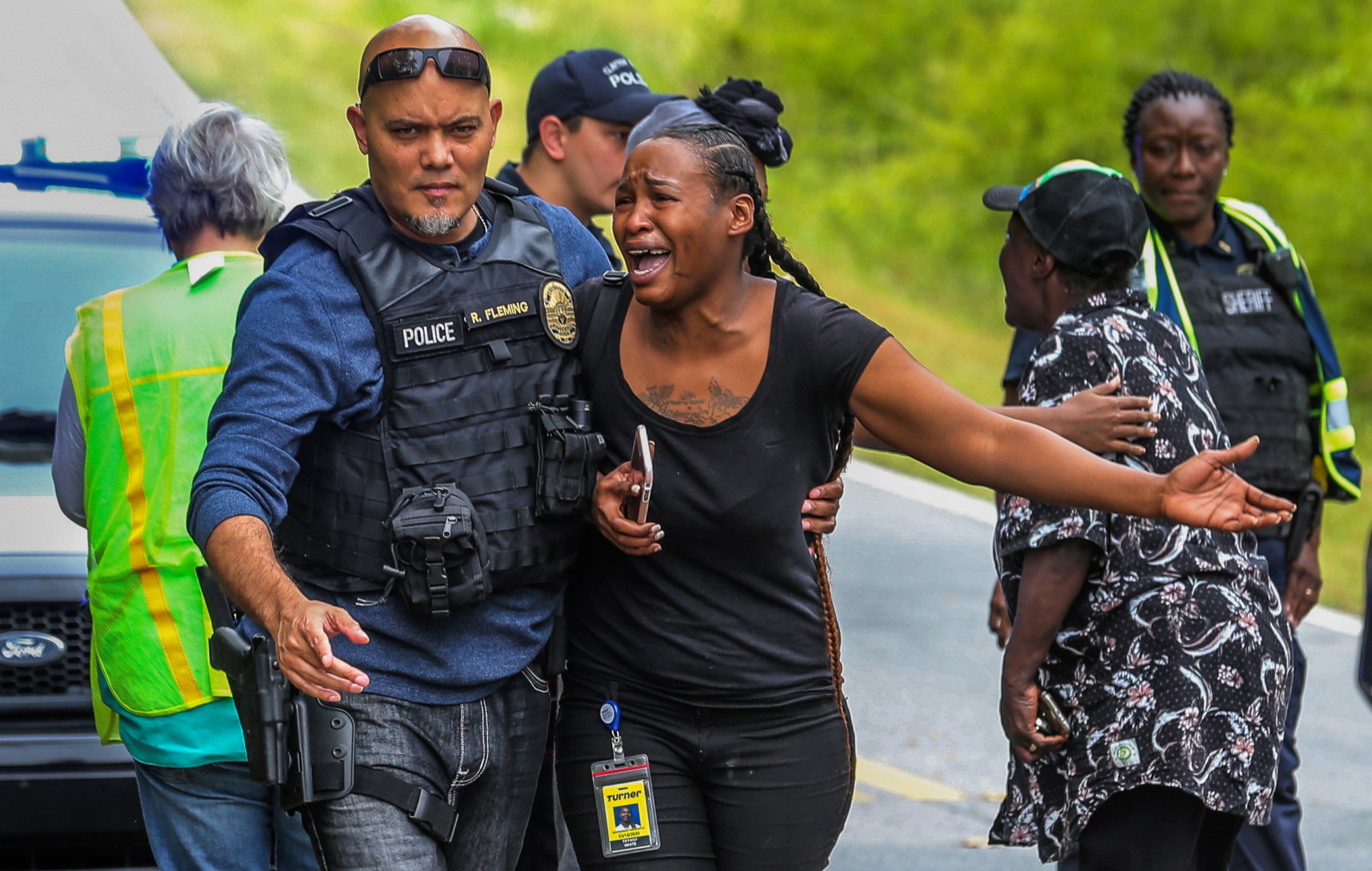 PHOTO: A woman believed to be related to ones involved in a hostage situation reacts as law enforcement on the scene tried to console them in Stockbridge, Ga., Thursday, April 4, 2019.