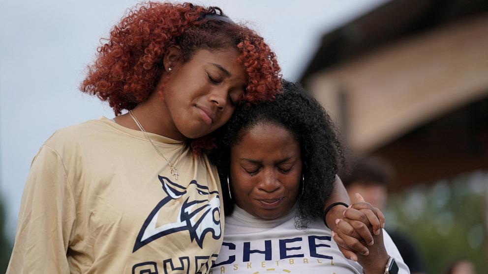 PHOTO: Women cry while attending a vigil at Jug Tavern Park following a shooting at Apalachee High School in Winder, Ga., Sept. 4, 2024.