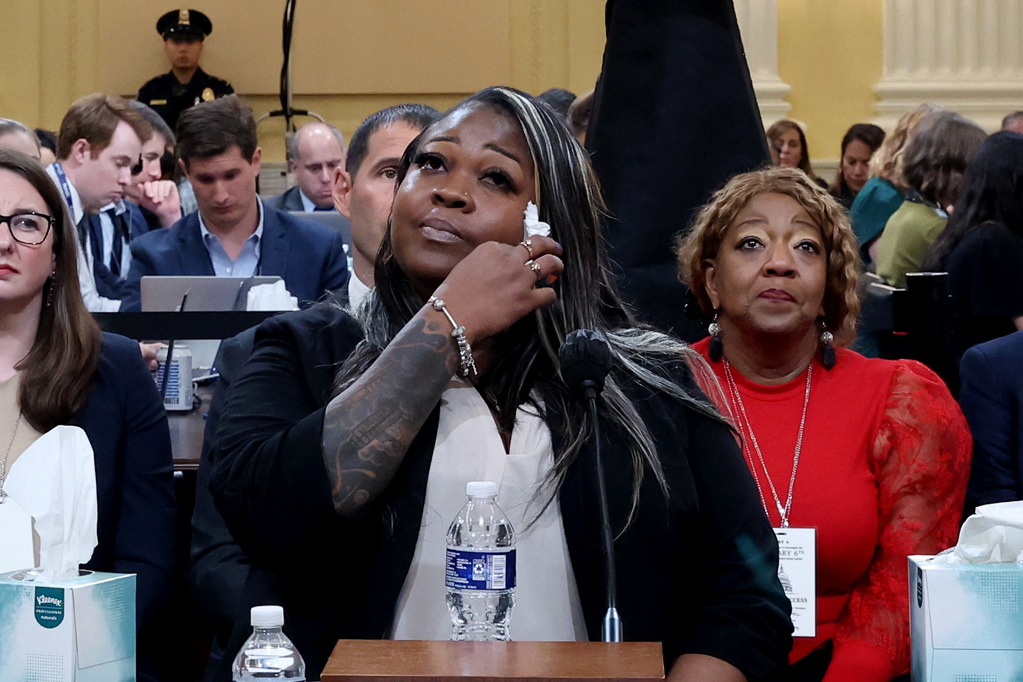 PHOTO: Wandrea "Shaye" Moss, former Georgia election worker, becomes emotional while testifying as her mother Ruby Freeman watches during the fourth hearing in Washington, June 21, 2022.