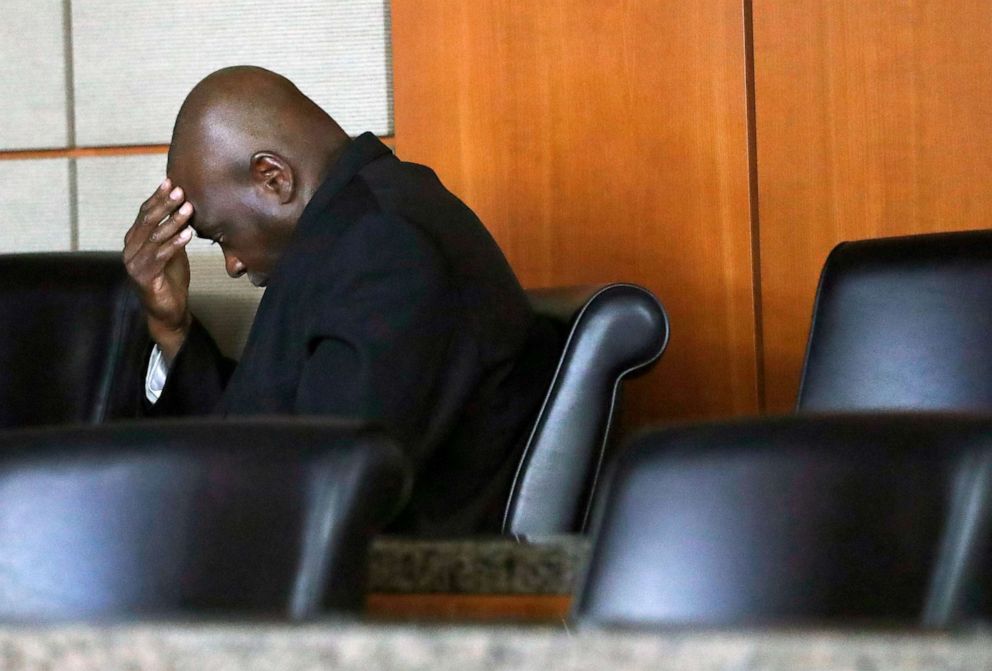 PHOTO: Former Houston police officer Gerald Goines sits in a chair as he and Steven Bryant turned themselves in at the Civil Courthouse, Friday, August 23, 2019, in Houston. 