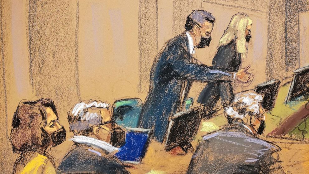 PHOTO: Jeffrey Epstein associate Ghislaine Maxwell sits near her defense lawyers Christian Everdell and Laura Menninger speaking with the judge, as deliberations extended into a second week in a courtroom sketch in New York, Dec. 27, 2021.
