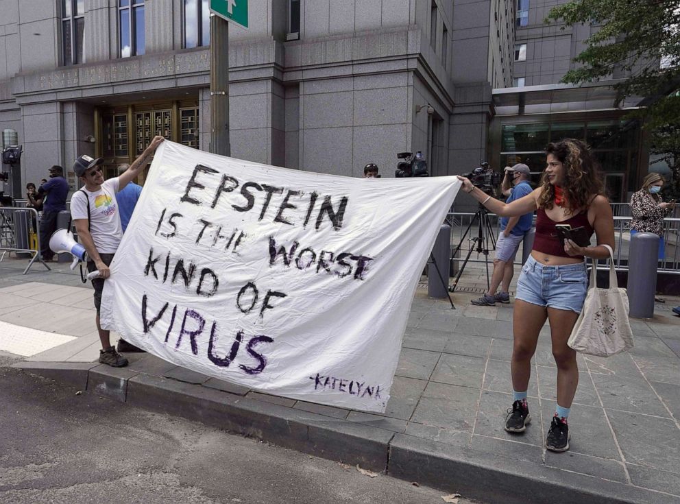 PHOTO: Protesters gather outside as Ghislaine Maxwell is set to make her first court appearance on July 14, 2020, at the US District Court for the Southern District of New York.