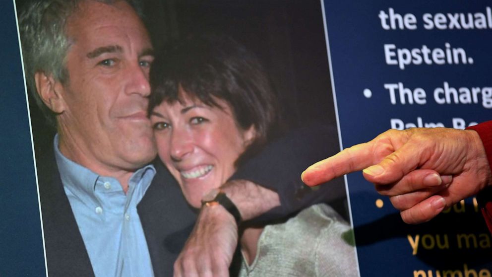 PHOTO: A photo of Ghislaine Maxwell and Jeffrey Epstein is displaced at a press conference announcing charges against Maxwell in New York, July 20, 2020. 
