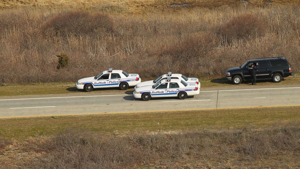 PHOTO: An aerial view of police cars near where a body was discovered in the area near Gilgo Beach and Ocean Parkway on Long Island, April 15, 2011, in Wantagh, New York. 
