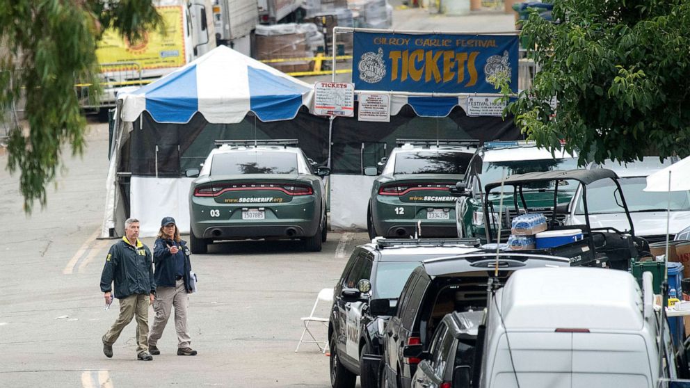 PHOTO: FBI personnel pass a ticket booth at the Gilroy Garlic Festival, July 29, 2019, in Calif., the morning after a gunman killed at least three people, including a 6-year-old boy, and wounded about 15 others.
