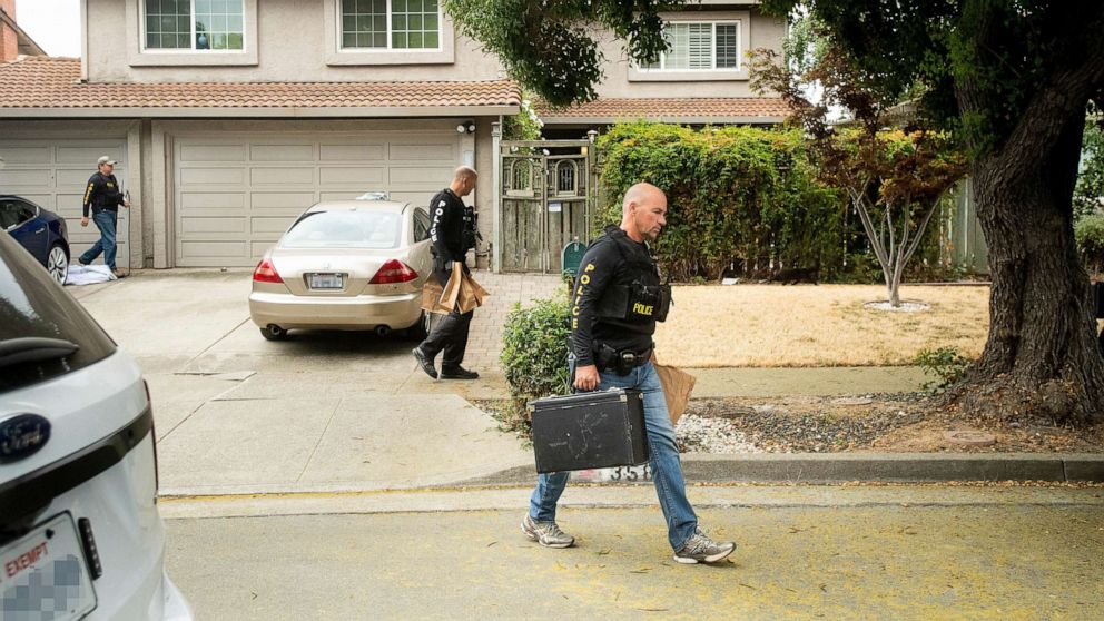 PHOTO: Police officers carry evidence bags from the family home of Gilroy Garlic Festival shooting suspect Santino William Legan, July, 29, 2019, in Gilroy, Calif.