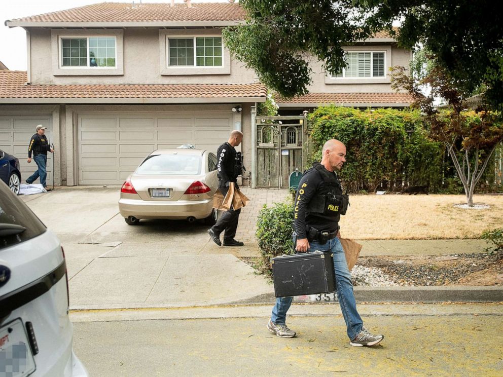 PHOTO: Police officers carry evidence bags from the family home of Gilroy Garlic Festival shooting suspect Santino William Legan, July, 29, 2019, in Gilroy, Calif.