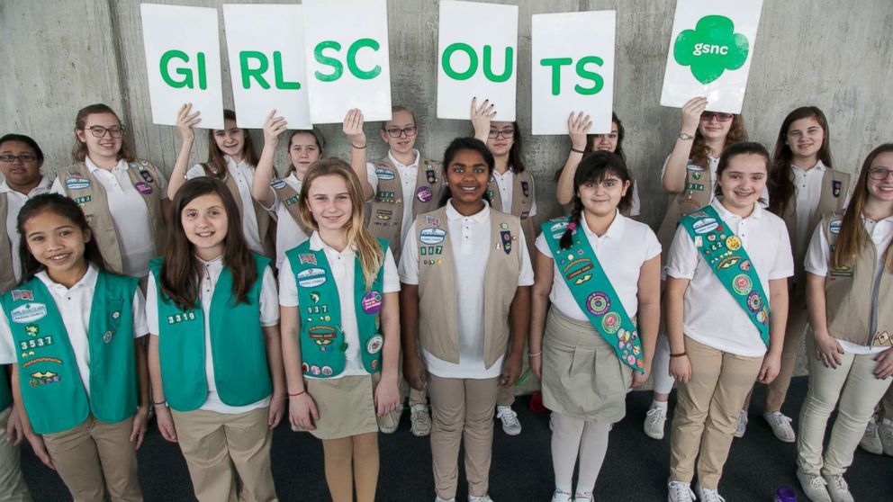 Group portrait of Girl Scouts as they pose during the Chocolate Expo at the Cradle of Aviation Museum, Garden City, New York, March 6, 2016.