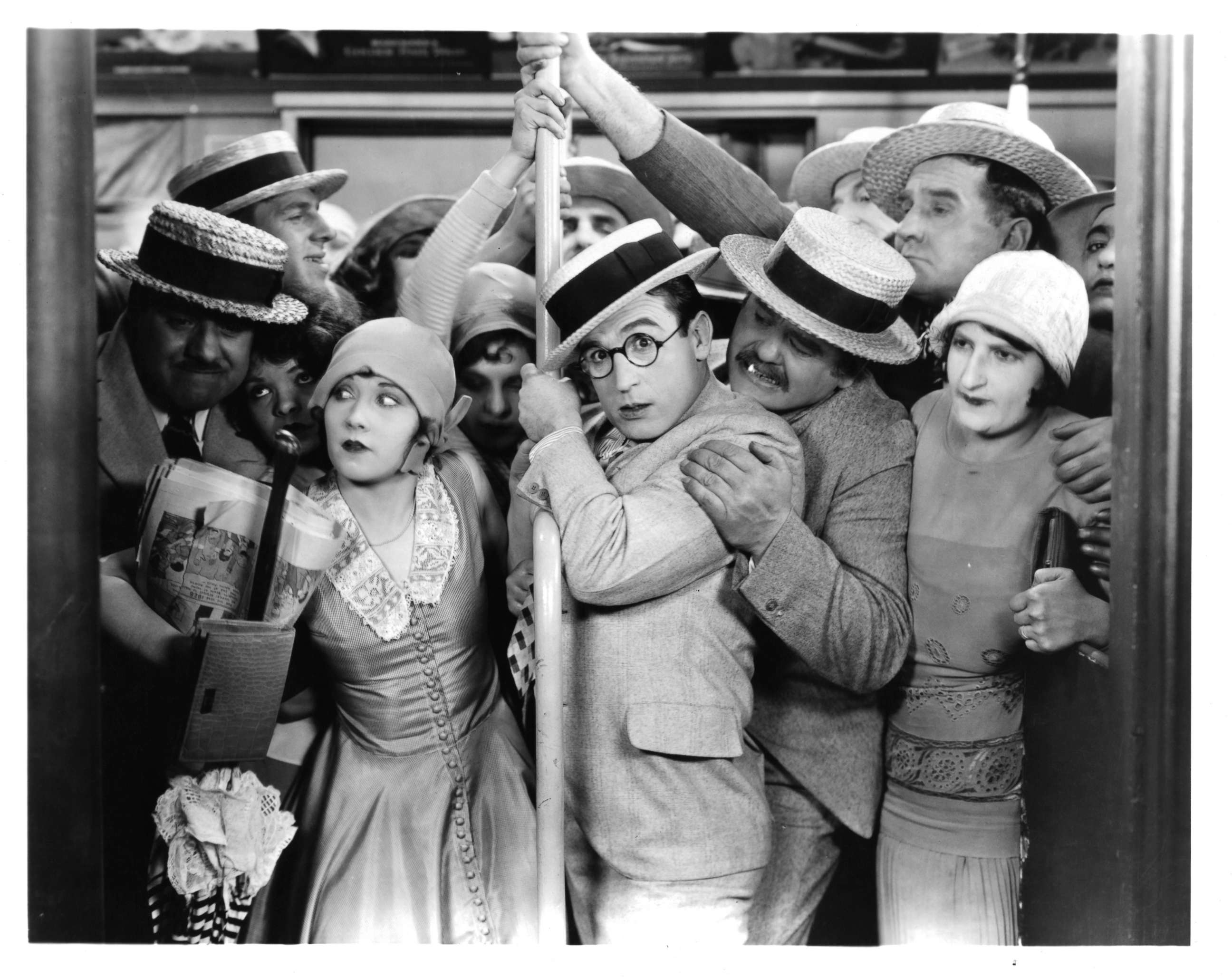 PHOTO: Harold Lloyd is packed in a crowded train in a scene from the film "Girl Shy," 1924.
