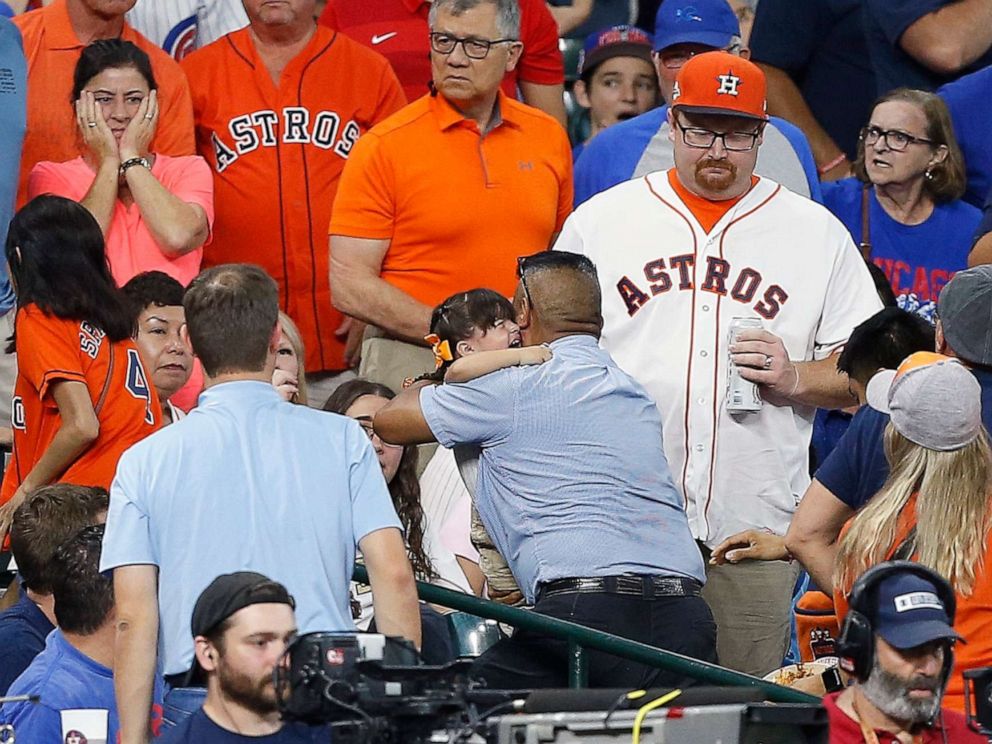 PHOTO: A young child is rushed from the stands after being injured by a hard foul ball off the bat of Albert Almora Jr. of the Chicago Cubs at Minute Maid Park on May 29, 2019, in Houston.