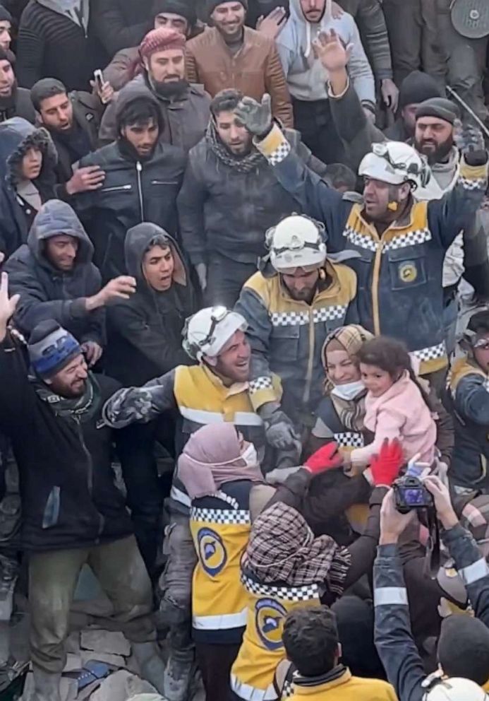 PHOTO: A girl is pulled from the rubble in the Idlib area of Syria, on Feb. 7, 2023, after an earthquake devastated the region.