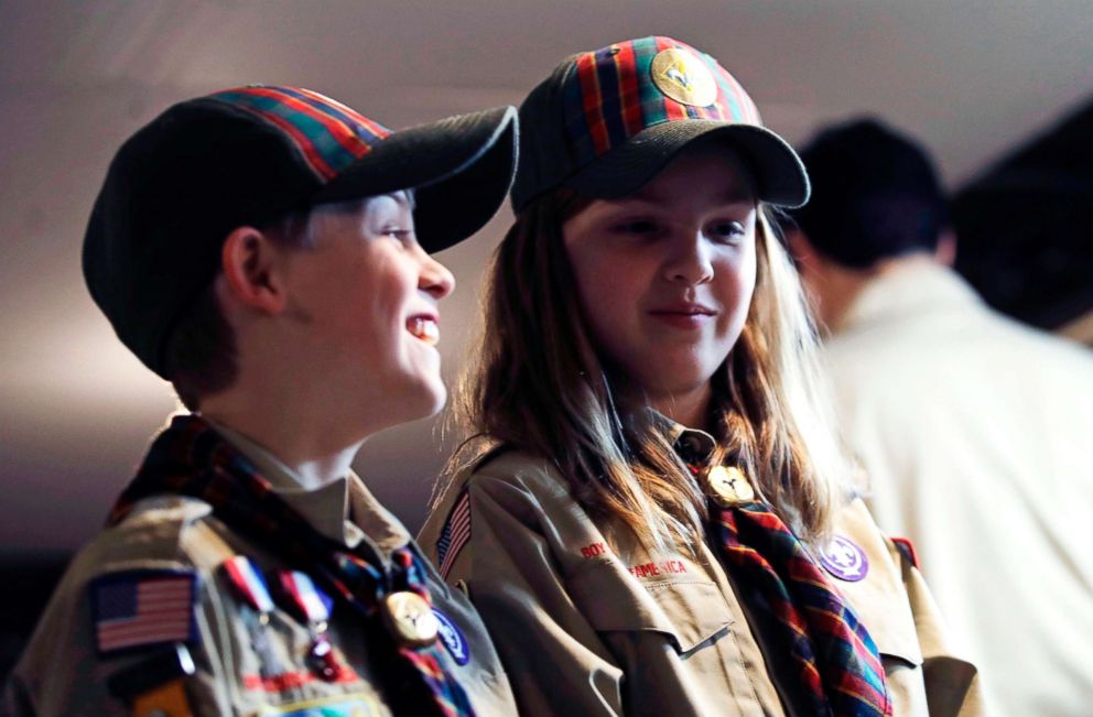 PHOTO: Ian Weir, left, stands with his twin sister Tatum after a cub scout meeting in Madbury, N.H, March 1, 2018. The twins already are planning to become the first set of girl-boy siblings to become Eagle Scouts. 