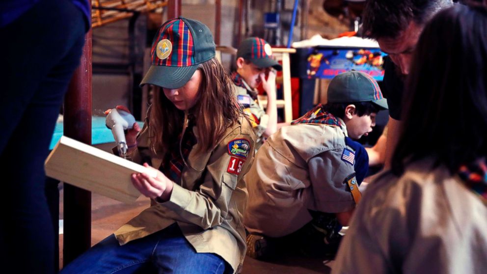 PHOTO: Tatum Weir, left, sets to drill a pilot hole while building a tool box during a cub scout meeting in Madbury, N.H, March 1, 2018. 