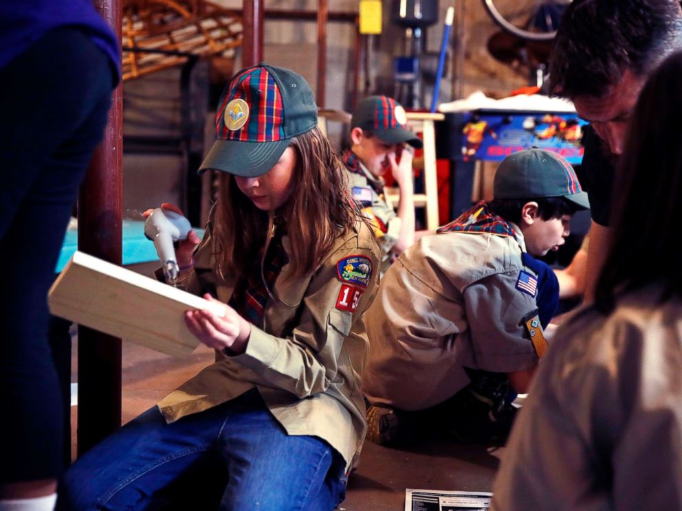 PHOTO: Tatum Weir, left, sets to drill a pilot hole while building a tool box during a cub scout meeting in Madbury, N.H, March 1, 2018.