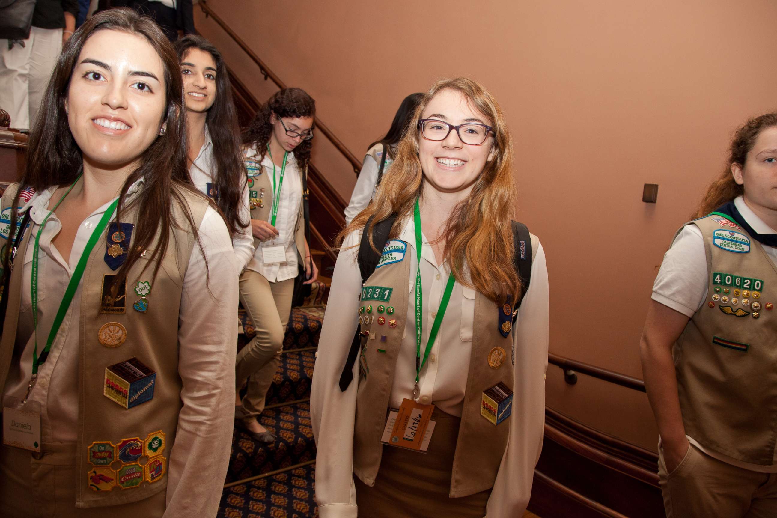 PHOTO: California Girl Scout Gold Award recipients Daniela Castro (L) and Sarah Gillespie (center) of Girl Scouts of Greater Los Angeles walk the halls of the State Capitol with their fellow awardees, on June 23, 2016, in Sacramento, Calif.  
