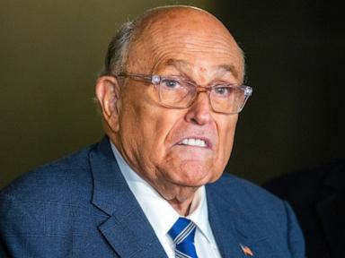 Judge holds Giuliani in contempt for failing to turn over property to poll workers