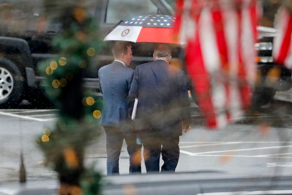 PHOTO: Rudy Giuliani, center right, personal attorney for President Donald Trump, is seen leaving the West Wing of the White House in Washington, Dec. 13, 2019.
 