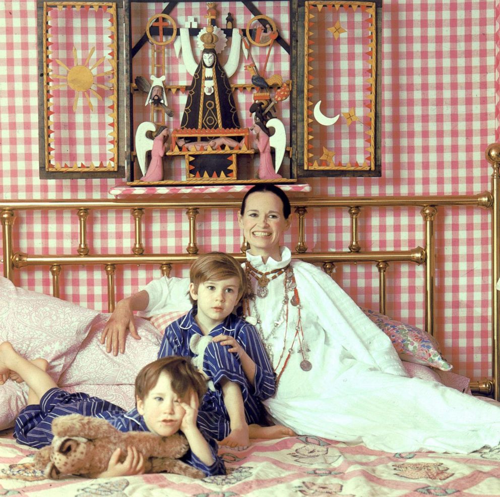 PHOTO: Socialite and heiress  Gloria Vanderbilt poses for a portrait session with her sons Anderson Cooper (left) and Carter Vanderbilt Cooper on a bed in their home, March 30, 1972, in Southampton, Long Island, New York.