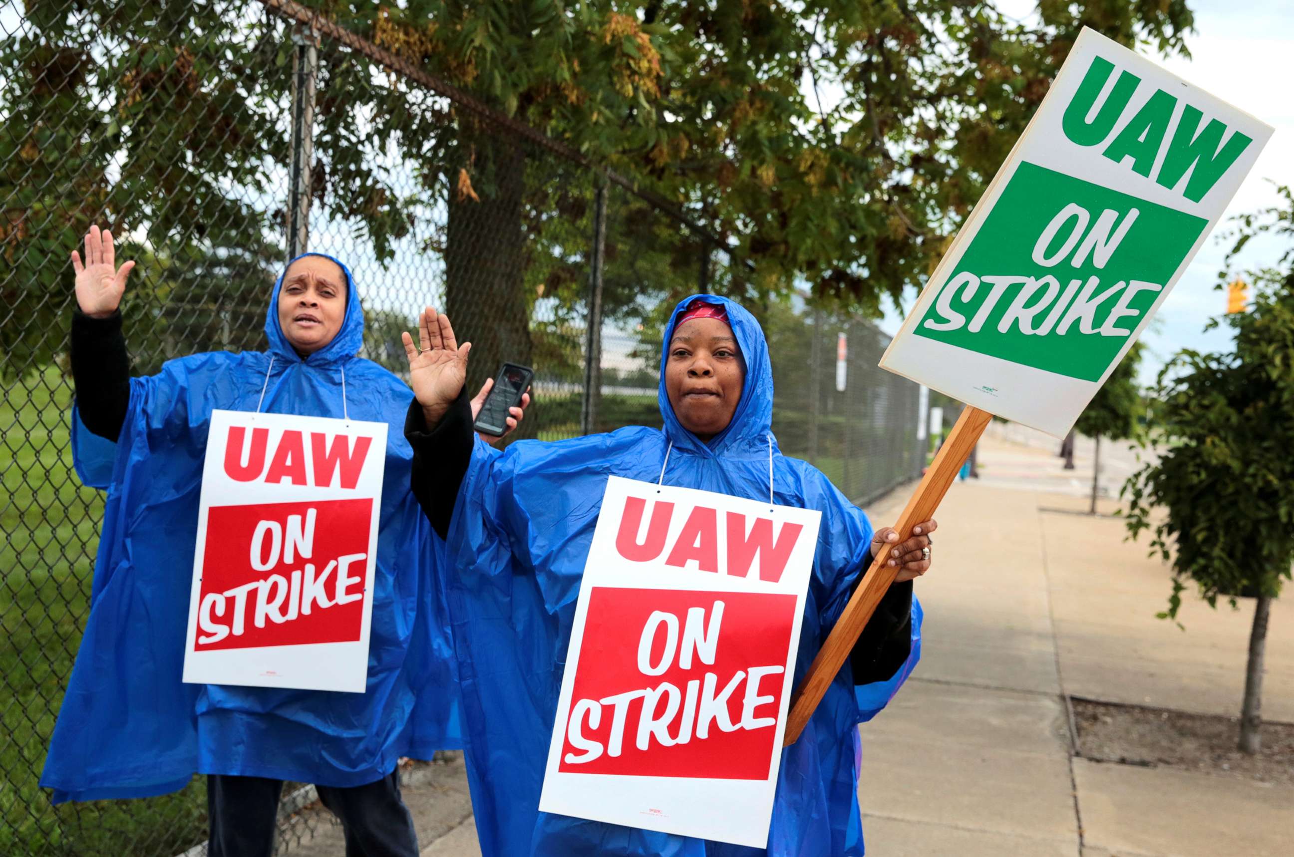 PHOTO: United Auto Workers, Aramark workers, carry strike signs outside the General Motors Detroit-Hamtramck assembly plant in Detroit, Sept. 15, 2019. 