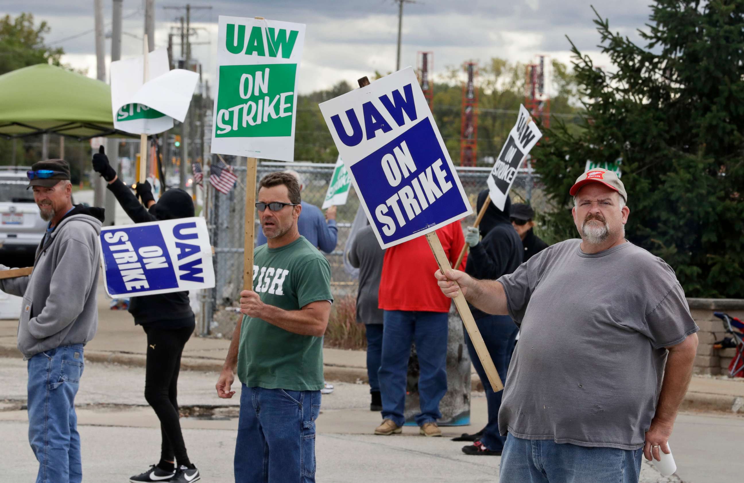PHOTO: John Kirk, right, a 20-year-employee, pickets with co-workers outside the General Motors Fabrication Division, Oct. 4, 2019, in Parma, Ohio. 