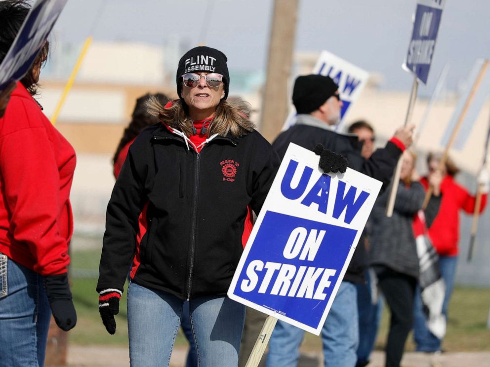 PHOTO: United Auto Workers union members and their families picket at the General Motors Flint Assembly plant on Solidarity Sunday on Oct. 13, 2019. in Flint, Michigan.