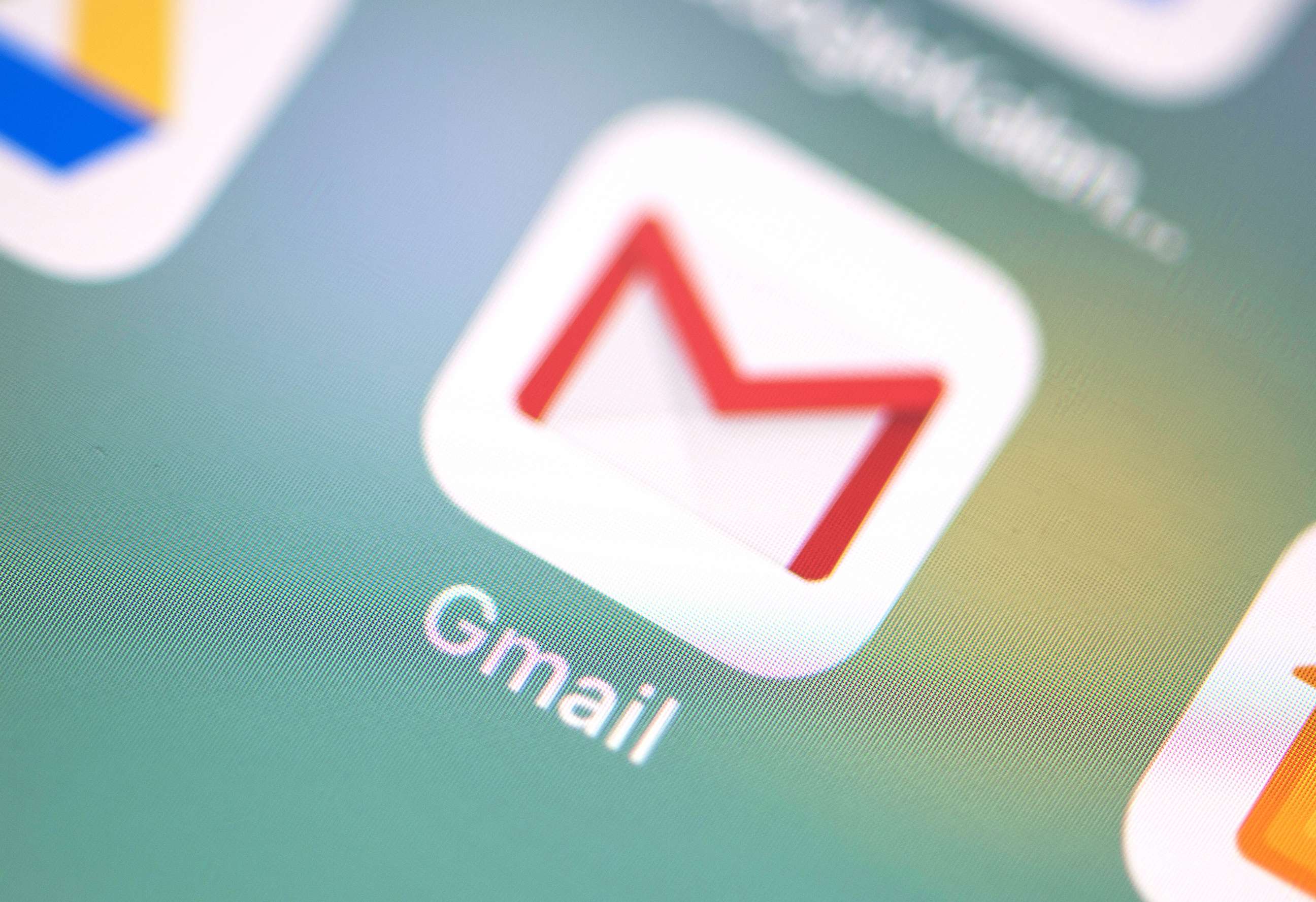 PHOTO: The logo of the Gmail application can be seen on the screen of an iPhone. 