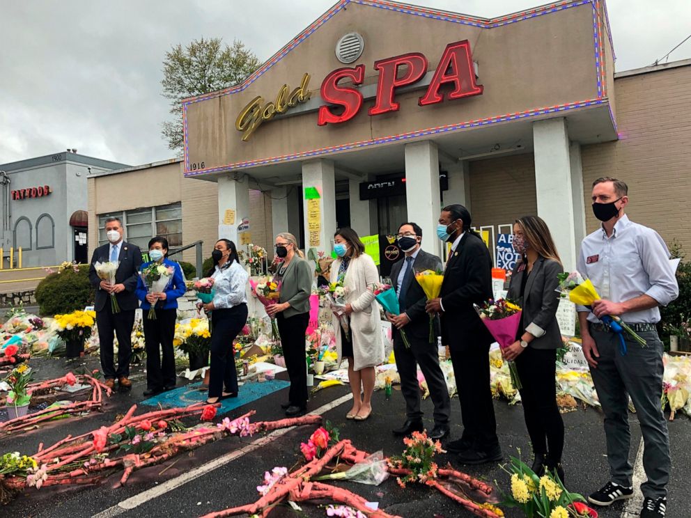 PHOTO: Members of Congress and Georgia state representatives pose for a photo outside Gold Spa in Atlanta, one of the businesses hit during the March 16 shootings, Sunday, March 28, 2021.