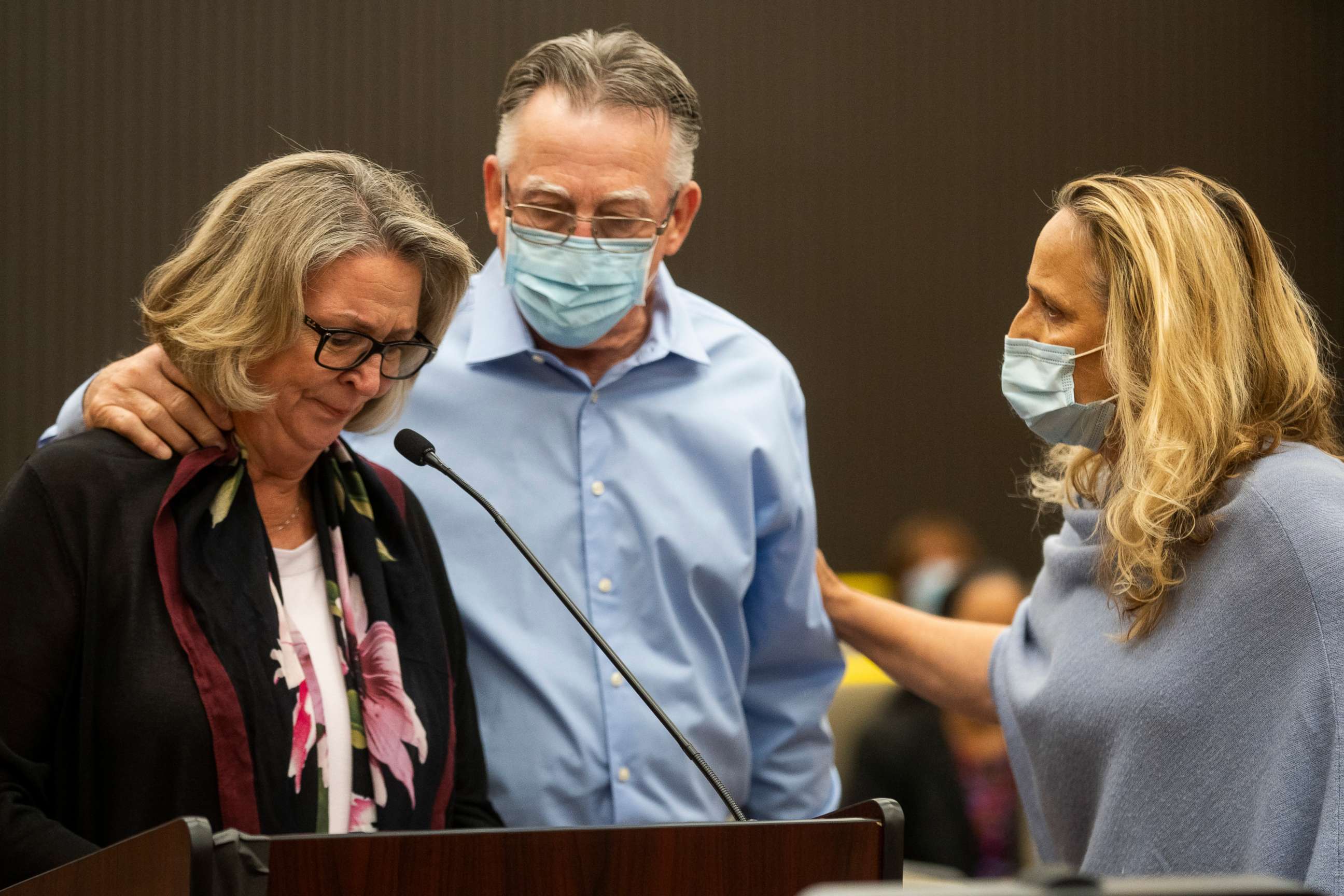 PHOTO: Gay Hardwick is comforted by her spouse Bob Hardwick during the second day of victim impact statements with Joseph James DeAngelo present at the Gordon D. Schaber Sacramento County Courthouse on Aug. 19, 2020, in Sacramento, Calif.