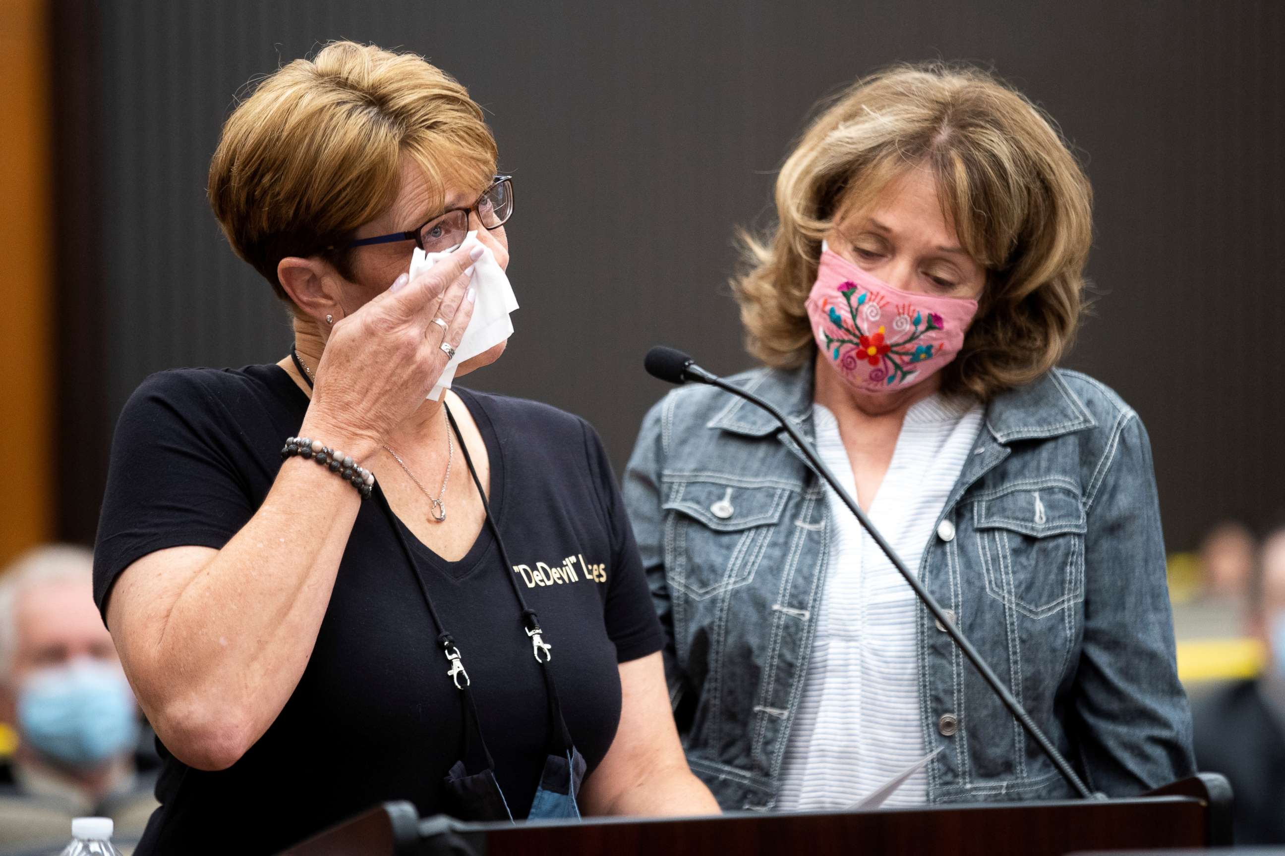 PHOTO: Debbi McMullan, with Melanie Barbeau standing by her side, confronts Joseph James DeAngelo, known as the Golden State Killer, on the third day of victim impact statements in Sacramento, Calif., Aug. 20, 2020.