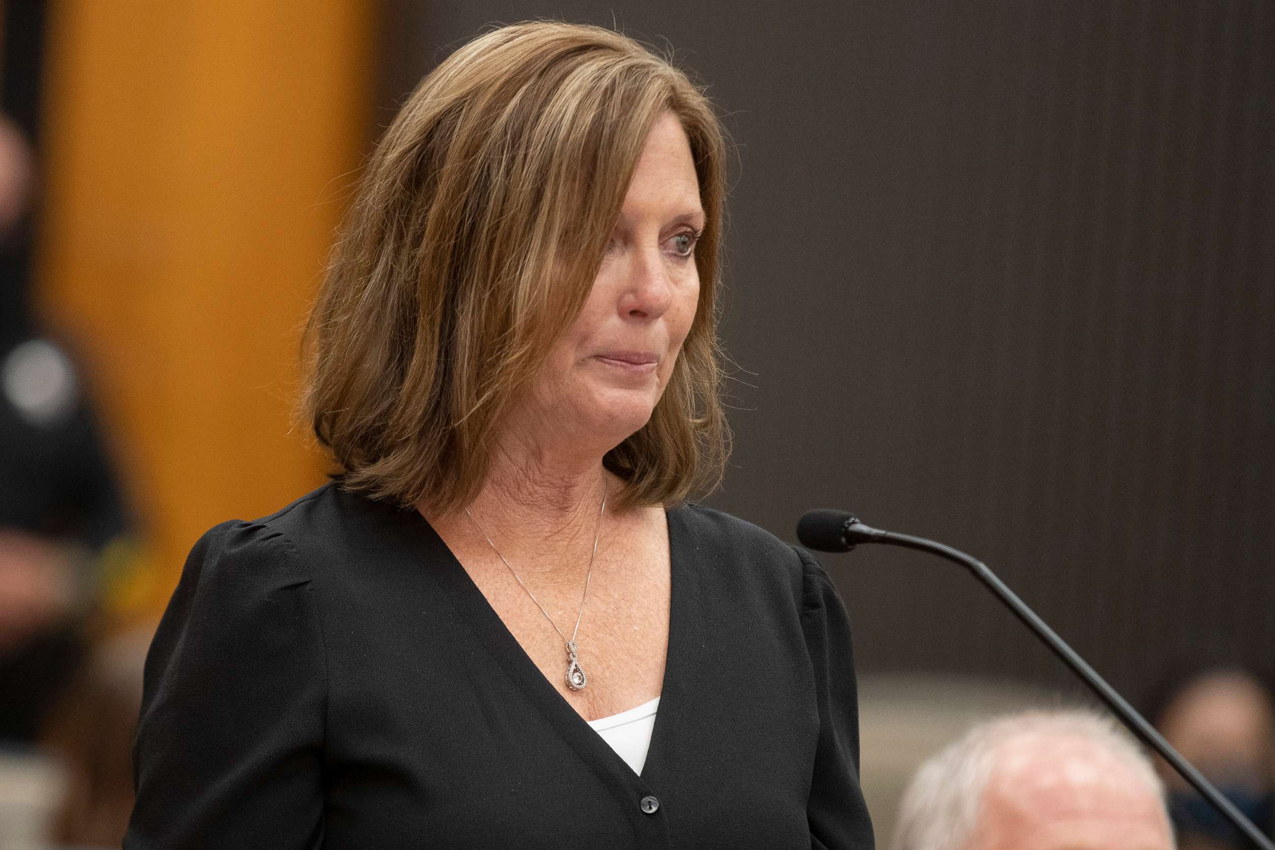 PHOTO: Kris Pedretti reads her victim impact statement as Joseph James DeAngelo is in the court room the Sacramento County Courthouse, in Sacramento, Calif. , Aug. 18, 2020.  