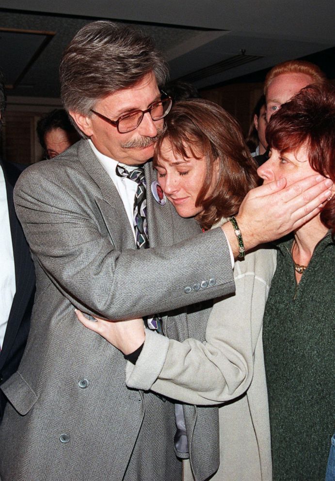 PHOTO: In this Feb. 4, 1997 file photo, Fred Goldman is hugged by his daughter Kim while patting his wife Patti's cheek during a news conference after the verdict in the wrongful death suit against O.J. Simpson in Santa Monica, Calif.