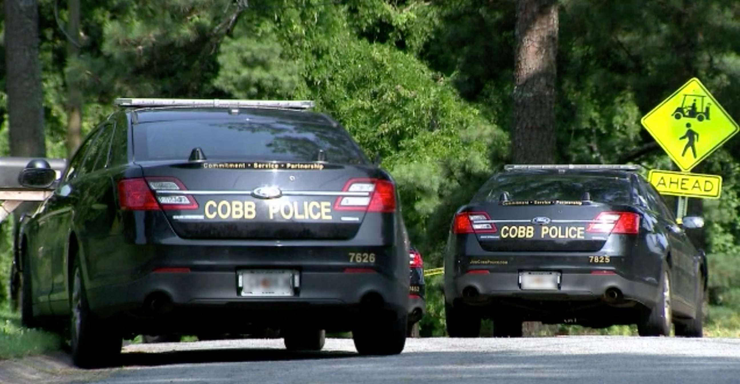 PHOTO: Cobb County Police at the scene of the shooting death of pro golfer Gene Siller at Pinetree Country Club in Kennesaw, Ga., July, 3, 2021. 