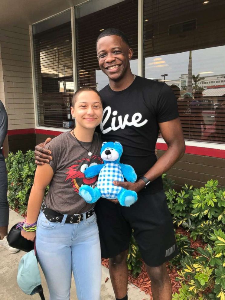 Parkland shooting survivor and activist Emma Gonzalez poses with James Shaw Jr., who stopped the shooter at a Waffle House near Nashville, Tenn., at a meeting on May 12, 2018.