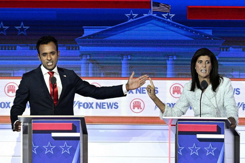 PHOTO: Entrepreneur and author Vivek Ramaswamy and former Governor from South Carolina and UN ambassador Nikki Haley gesture as they speak during the first Republican Presidential primary debate at the Fiserv Forum in Milwaukee, Aug. 23, 2023.