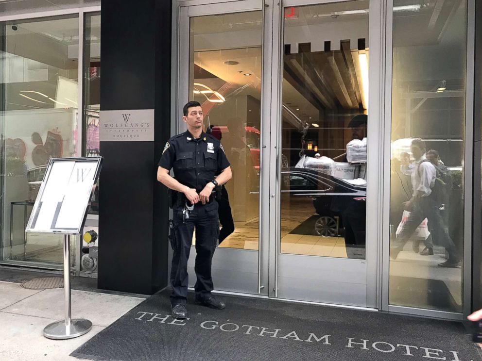 PHOTO: A police officer stands outside the Gotham Hotel in New York after reports that a woman jumped from the building with a child on May 18, 2018.