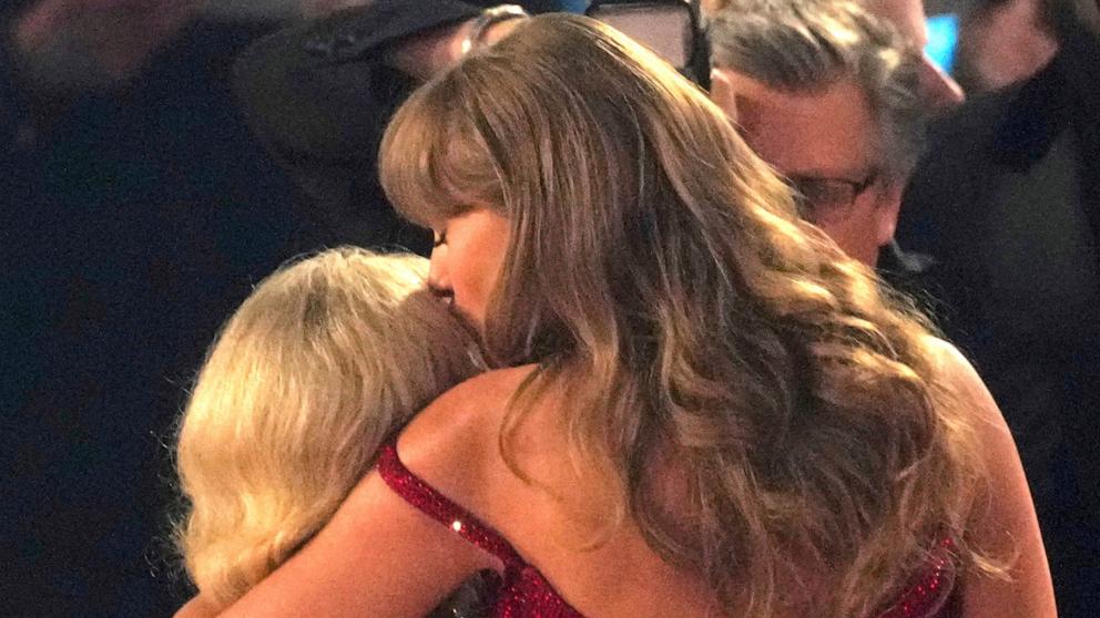 PHOTO: Sabrina Carpenter is embraced by Taylor Swift after winning Best Pop Vocal Album award during the 67th annual Grammy Awards, Feb. 2, 2025, in Los Angeles. 