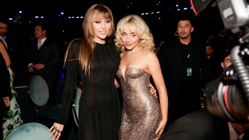 PHOTO: Miley Cyrus and Sabrina Carpenter attend the 67th Annual GRAMMY Awards, Feb. 2, 2025 in Los Angeles.