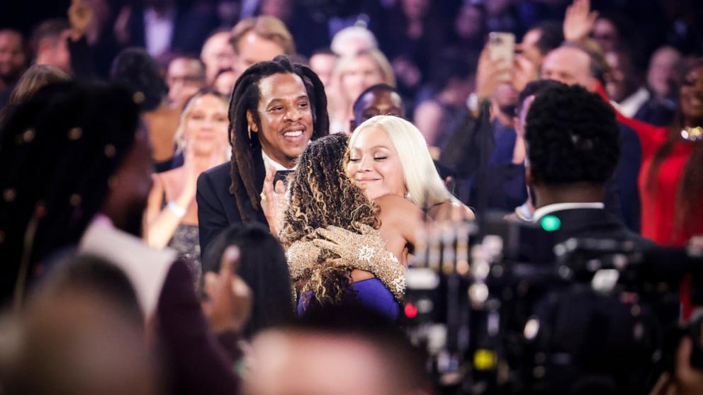 PHOTO: Jay-Z and Blue Ivy Carter hug Beyonce after she won Album of the Year award for "Cowboy Carter" during the 67th Annual Grammy Awards in Los Angeles, Feb. 2, 2025.